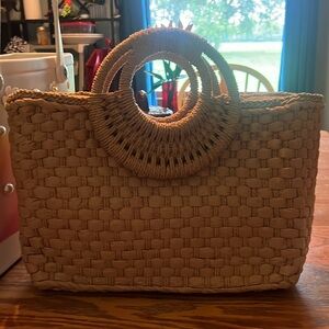 Beautiful, well-made, woven tote bag in like new condition.